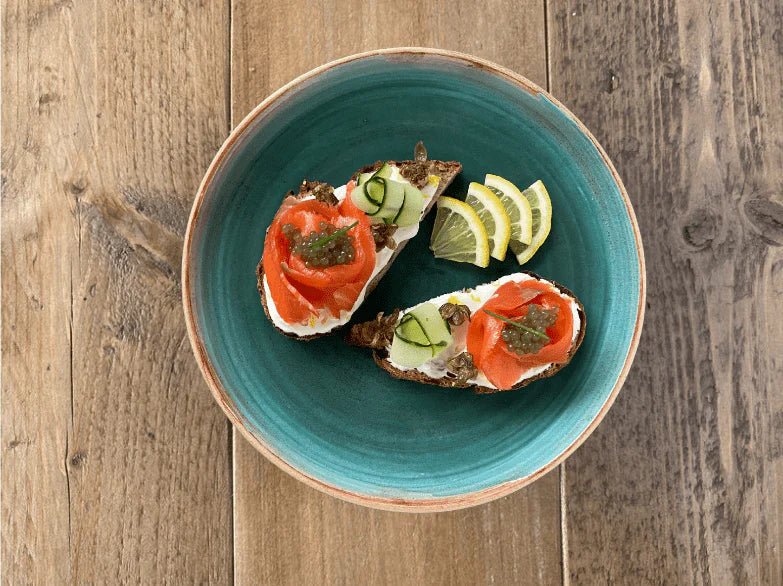 Open sandwich with smoked salmon and algae pearls